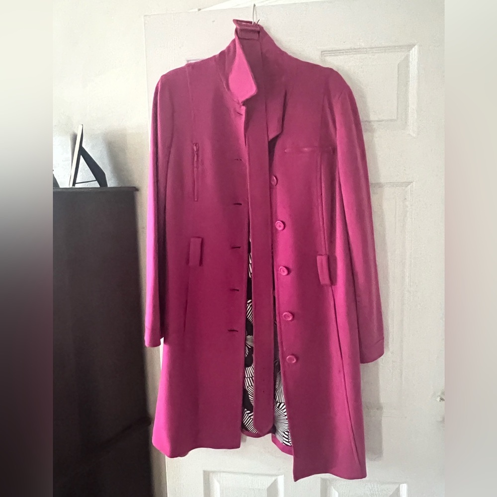 Beautiful belted pink coat.